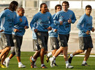 Uruguay's team players run during a training session on July 5. Uruguay's team players run during a training session on July 5.